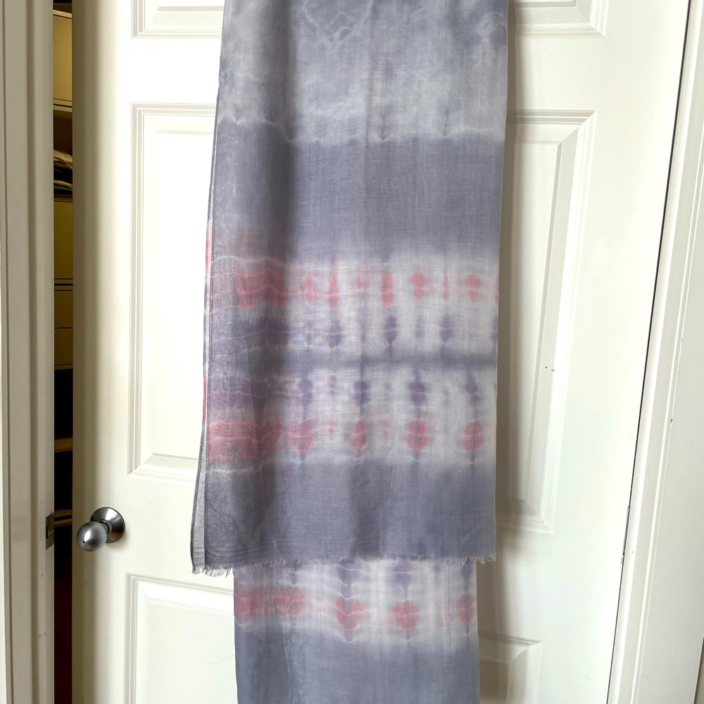 Blue gray scarf with pink detail.